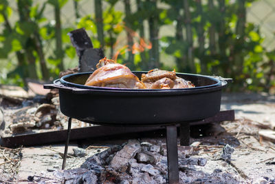 Close-up of meat on barbecue grill