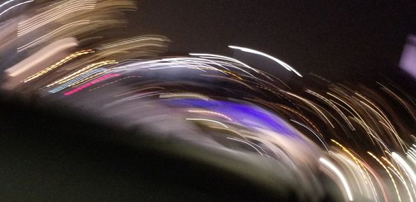 Light trails in sky at night