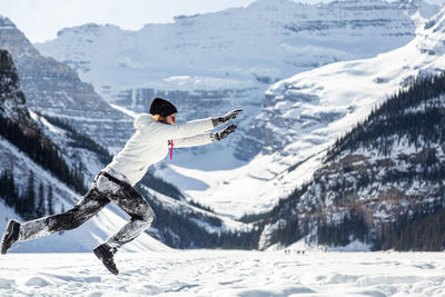 Man skiing on snowcapped mountain