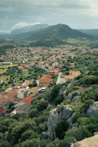 High angle view of houses on landscape in town