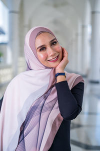Portrait of a smiling young woman