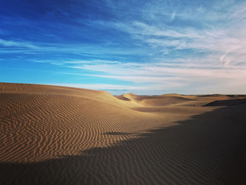 Scenic view of desert against sky