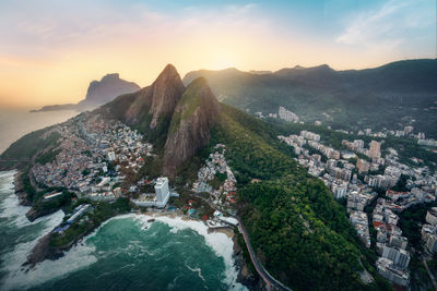 Aerial view of townscape against sky during sunset