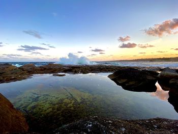 Scenic view of sea against sky during sunset