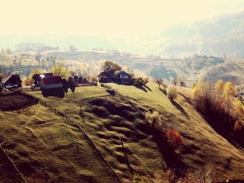 Panoramic shot of agricultural field against sky