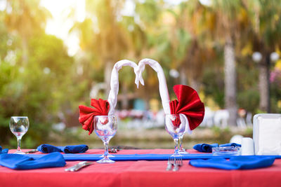 Red and wine glass on table in restaurant