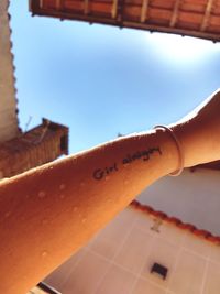 Close-up of hand against clear sky