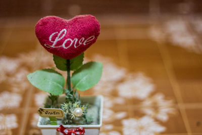 Close-up of text on heart shape