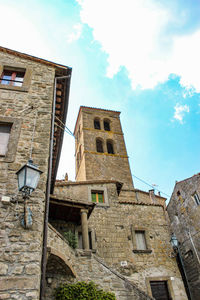 Low angle view of old building against sky