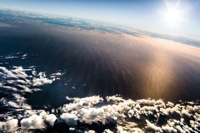 Sun shining over landscape
