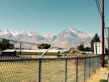 Scenic view of snowcapped mountains against clear sky