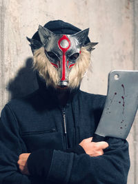 Man in werewolf halloween costume, ready to strike