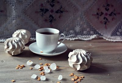 Coffee cup on table