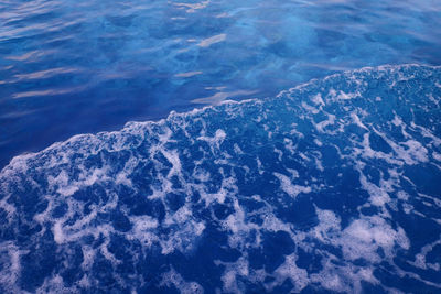 Scenic view of sea against blue sky