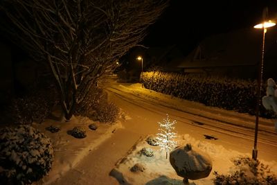 Illuminated street light at night