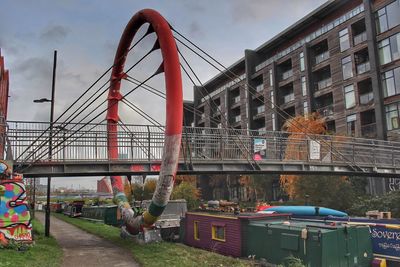 Bridge against sky in city