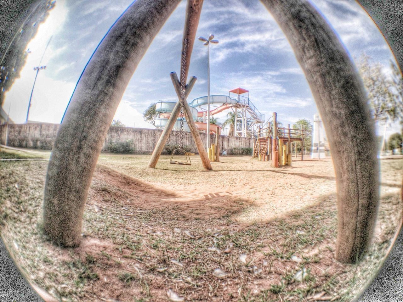 sky, cloud - sky, wheel, metal, grass, day, tree, field, transportation, built structure, abandoned, rusty, no people, bicycle, outdoors, old, cloud, metallic, sunlight, architecture