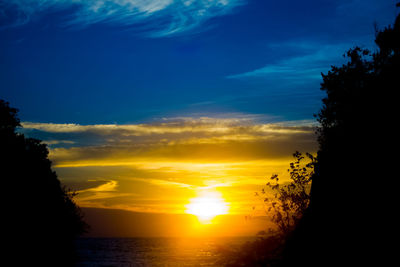 Scenic view of sunset over river