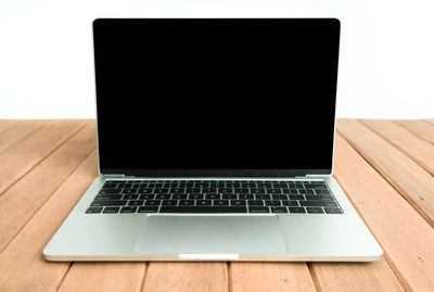 Close-up of laptop on table