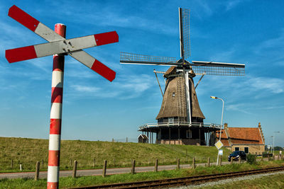 Two crosses - windmill and level crossing