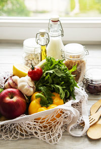 Close-up of fruits in basket on table