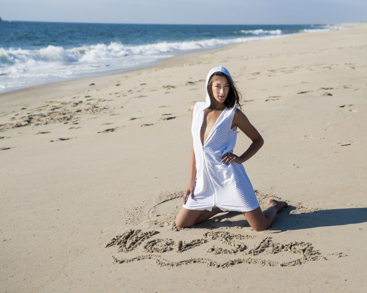 beach, sand, shore, sea, horizon over water, lifestyles, leisure activity, vacations, full length, summer, casual clothing, tranquility, nature, day, relaxation, outdoors, sky, tranquil scene, beauty in nature, scenics, portrait