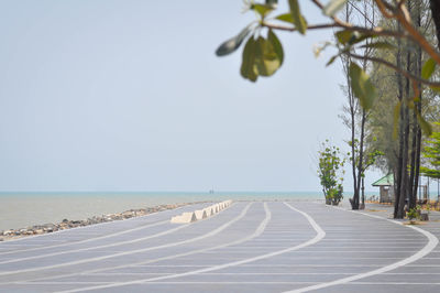 Scenic view of beach against clear sky