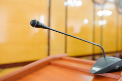 Close-up of microphone in auditorium