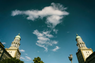 Low angle view of bell tower against sky