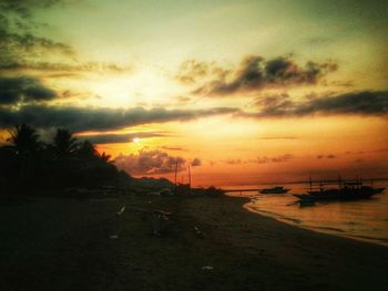 Scenic view of sea at sunset