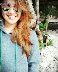 Portrait of smiling young woman