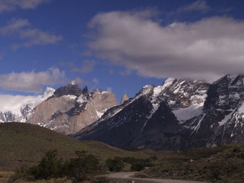 Scenic view of mountains against cloudy sky. torres del paine mountains, chile