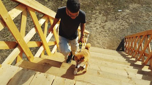 High angle view of man on staircase