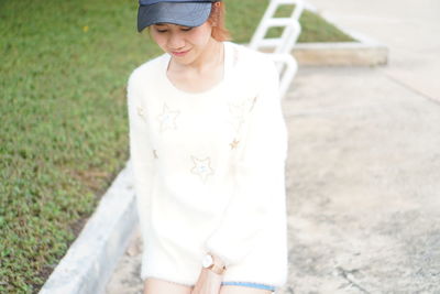 Young woman standing outdoors