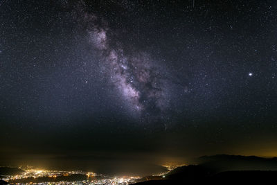 Low angle view of star field against sky at night