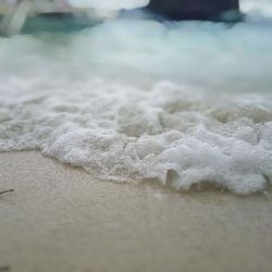 Close-up of waves on beach