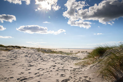 Scenic view of beach against sky