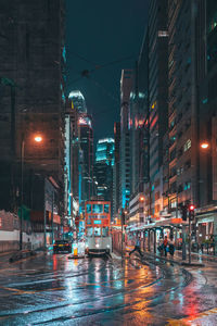 Illuminated buildings in city at night