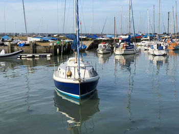 Boats moored in harbor