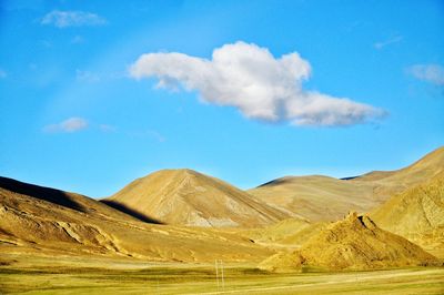 View of landscape against cloudy sky