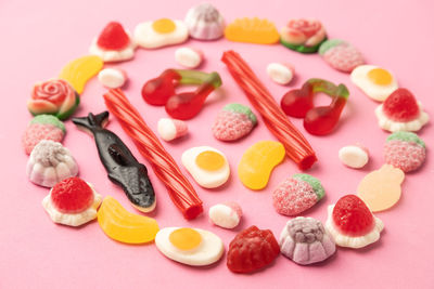 High angle view of multi colored candies on table