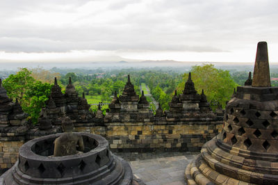 Borobodur temple against cloudy sky