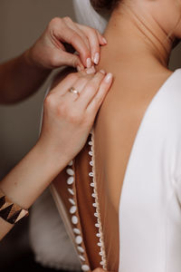 Midsection of woman with henna tattoo