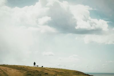 Scenic view of land against sky