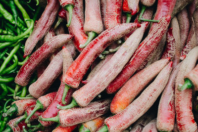 Full frame shot of red chili peppers for sale in market