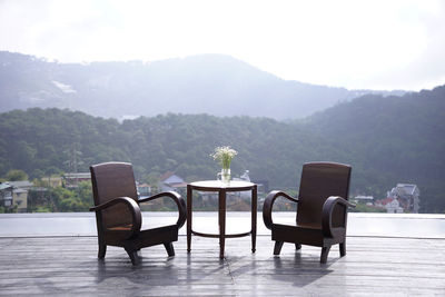 Empty chairs and tables in restaurant