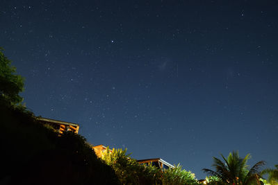 Low angle view of building against sky at night