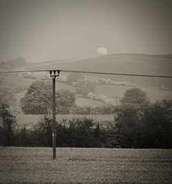 Street light against sky