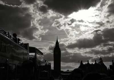 Low angle view of building against cloudy sky