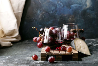 Close-up of fruits in jar on table